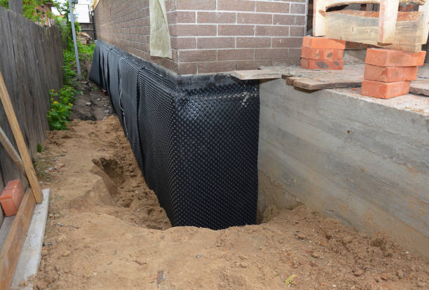 Happy homeowners after waterproofing job in Cooksville